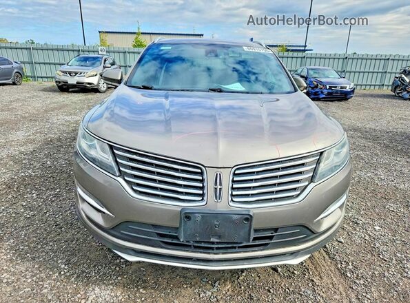 5LMCJ2D9XGUJ02884 2016 LINCOLN MKC Tan Вид ззаду