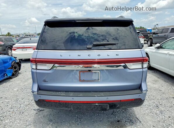 5LMJJ2TGXREL09747 2024 LINCOLN NAVIGATOR Silver Vista trasera