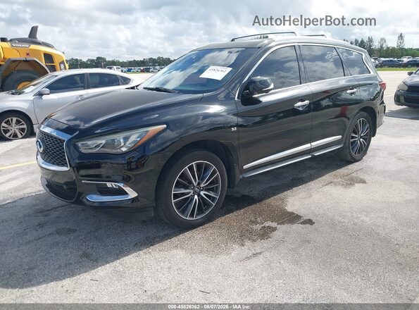 5N1AL0MMXGC515780 2016 INFINITI QX60 Black Vista tres cuartos delantera izquierda