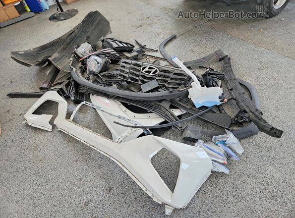 5NMJACDE7RH333768 2024 HYUNDAI TUCSON White VIN կոդի պիտակի տեսք