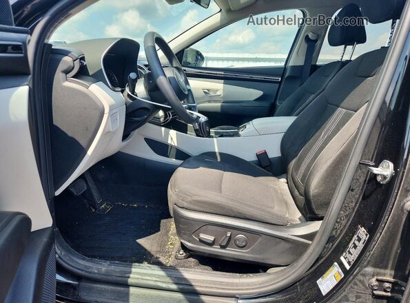 5NMJBCAE5PH202045 2023 HYUNDAI TUCSON Black Front interior view