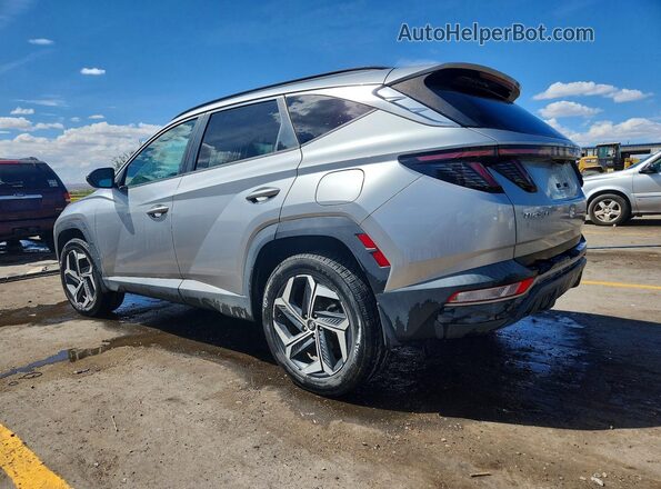 5NMJCCAE8NH119901 2022 HYUNDAI TUCSON Silver Trasero izquierdo