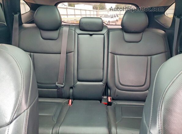 5NMJECAE2NH052612 2022 HYUNDAI TUCSON White Vista de los asientos traseros