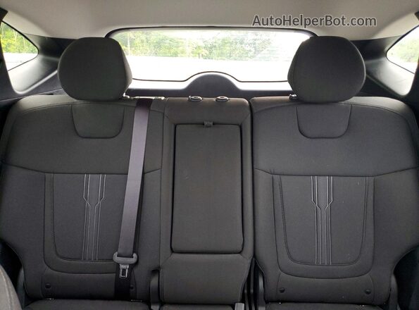 5NMJFCAE0NH106034 2022 HYUNDAI TUCSON Black Vista de los asientos traseros