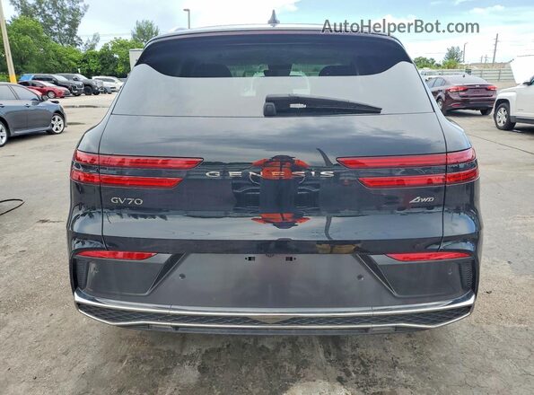 5NMMADTB5TH041828 2026 GENESIS GV70 Black Rear view