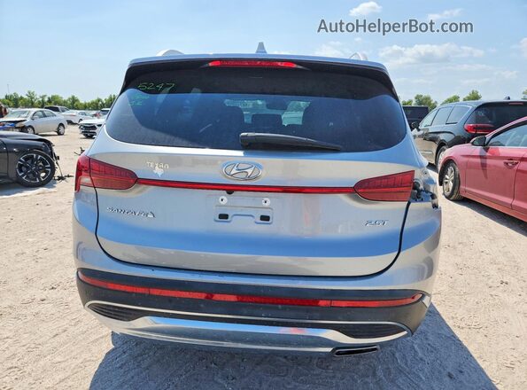 5NMS44AL4PH605663 2023 HYUNDAI SANTA Silver Rear view