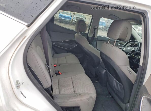 5NMZT3LB6HH004031 2017 HYUNDAI SANTA White Rear interior view