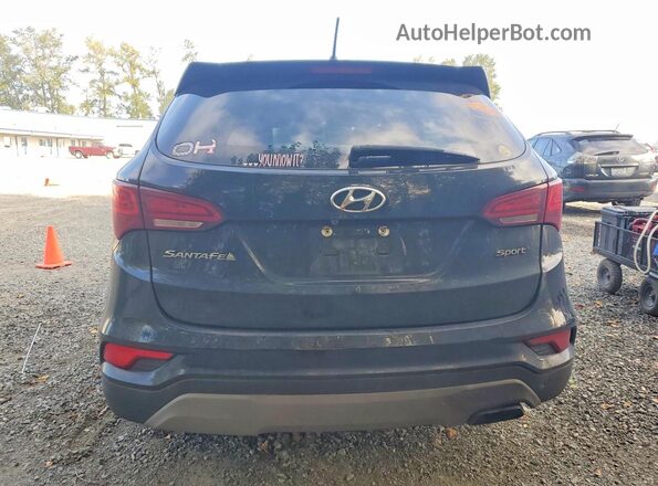 5NMZT3LB6JH071802 2018 HYUNDAI SANTA Black Rear view