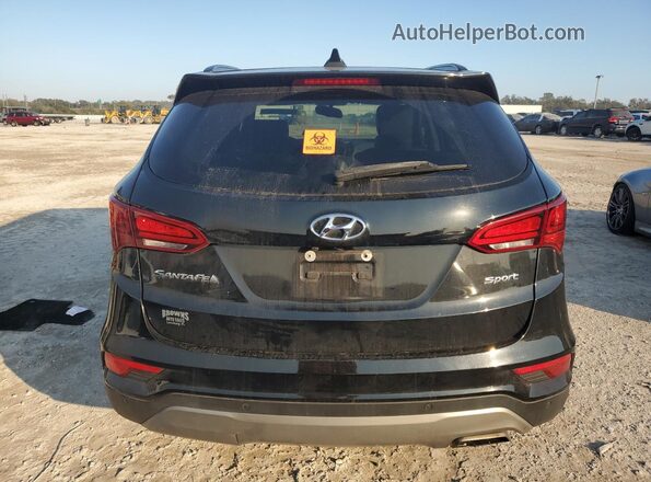 5NMZU3LB0HH033585 2017 HYUNDAI SANTA Black Widok z tyłu