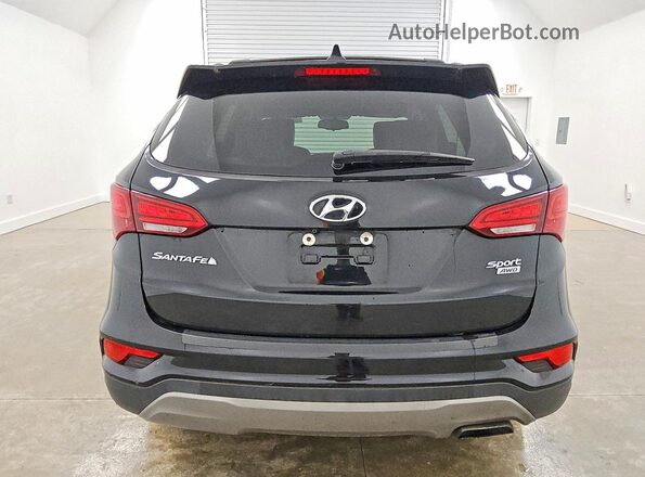 5NMZUDLB0HH008627 2017 HYUNDAI SANTA Black Rear view