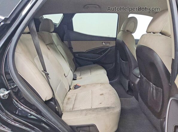 5NMZUDLB0HH008627 2017 HYUNDAI SANTA Black Rear interior view