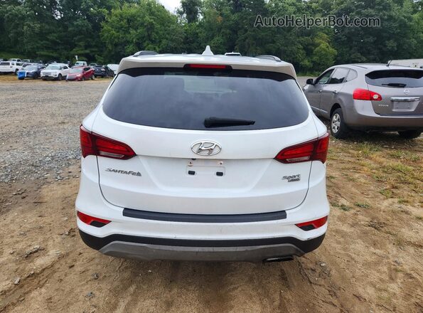 5NMZUDLB7JH082746 2018 HYUNDAI SANTA White Rear view