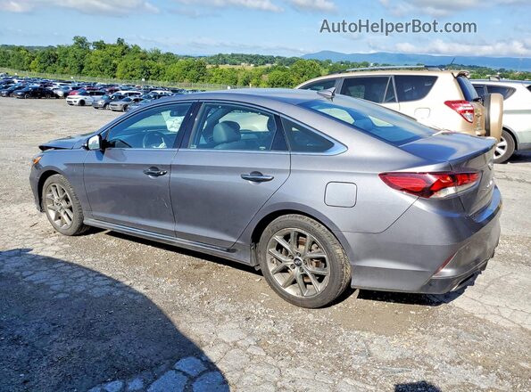 5NPE34AB8JH681906 2018 HYUNDAI SONATA Charcoal Trasero izquierdo