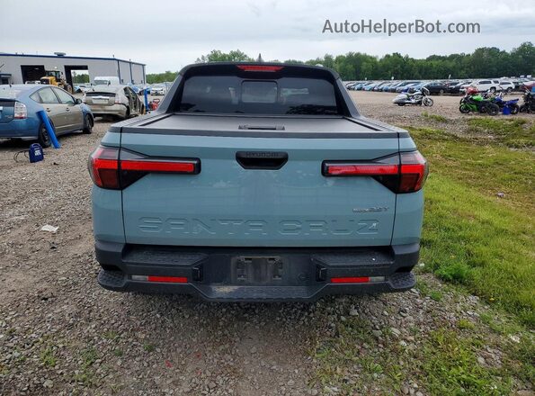 5NTJDDAF0PH049880 2023 HYUNDAI SANTA Blue Rear view