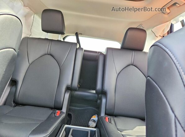 5TDAAAA50TS039335 2026 TOYOTA GRAND Blue Vista de los asientos traseros