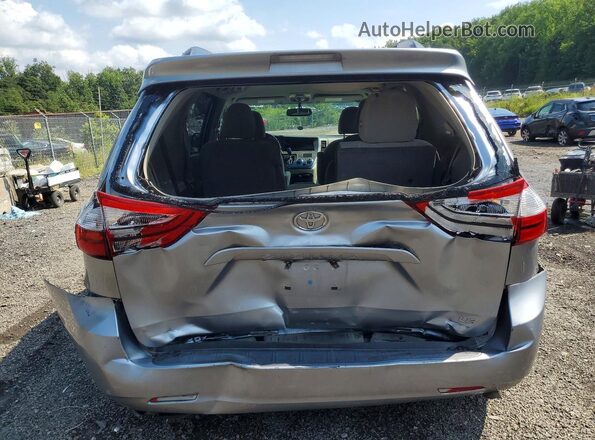 5TDKZ3DC9HS899213 2017 TOYOTA SIENNA Silver Rear view