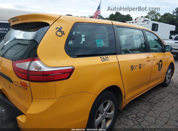 5TDZK3DC8GS695746 2016 TOYOTA SIENNA Yellow Rear interior view