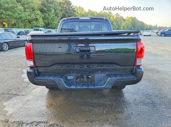 5TFAX5GNXLX167699 2020 TOYOTA TACOMA Black Front interior view