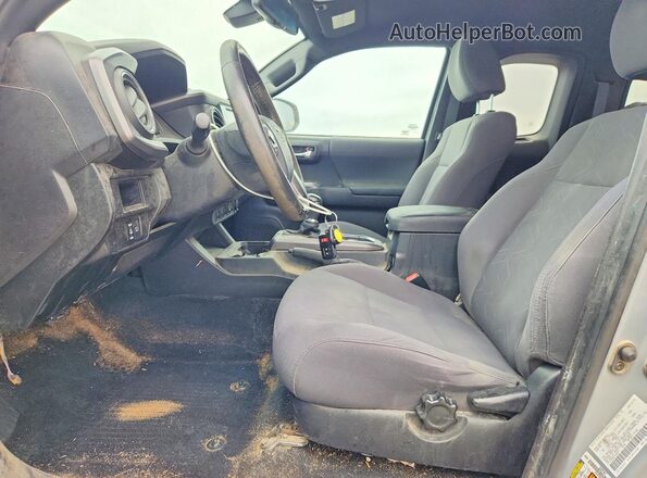 5TFSZ5AN2KX182977 2019 TOYOTA TACOMA Gray Вид салону спереду