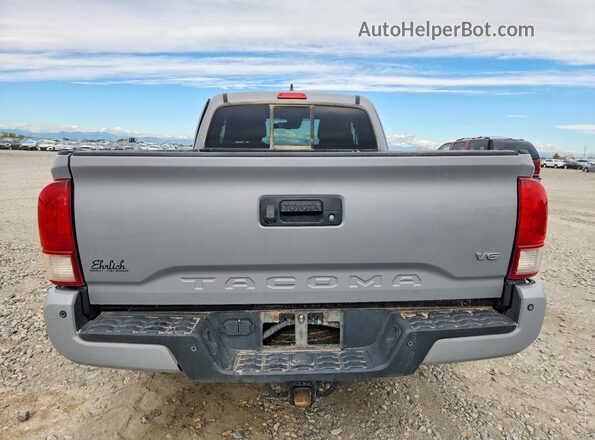 5TFSZ5AN2KX182977 2019 TOYOTA TACOMA Gray Вид ззаду