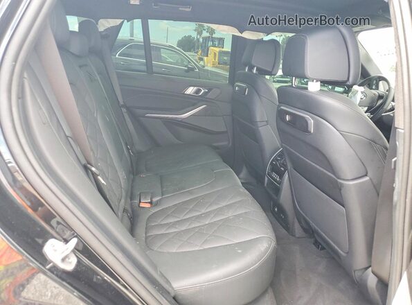 5UX13EU01R9U34292 2024 BMW X5 Black Вид задньої частини салону