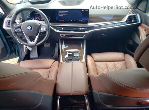 5UX23EU01S9W74128 2025 BMW X5 Blue Dashboard view