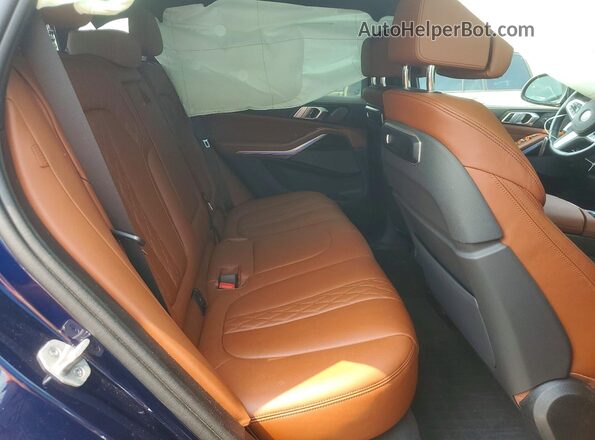 5UX23EU03R9U22178 2024 BMW X5 Синий Вид задней части салона