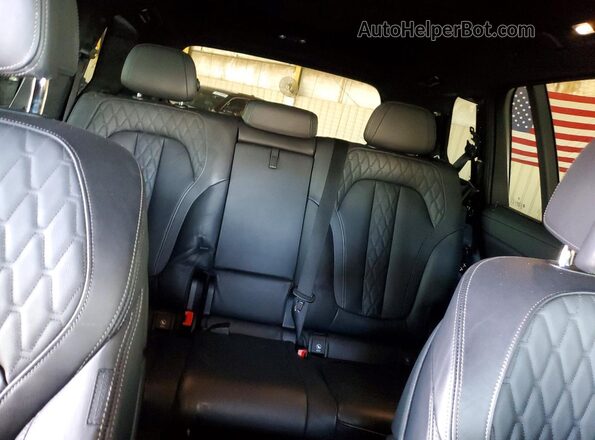 5UX33EM00P9N44403 2023 BMW X7 Black Вид задніх сидінь