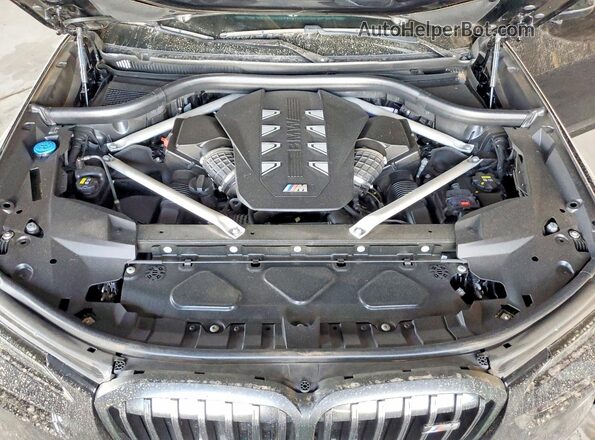 5UX33EM00P9N44403 2023 BMW X7 Black Вид підкапотного простору