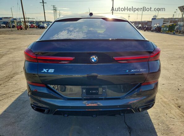 5UX33EX06T9037799 2026 BMW X6 Black უკანა ხედი