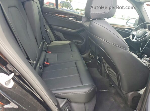 5UX43DP06P9R48624 2023 BMW X3 Черный Вид задней части салона