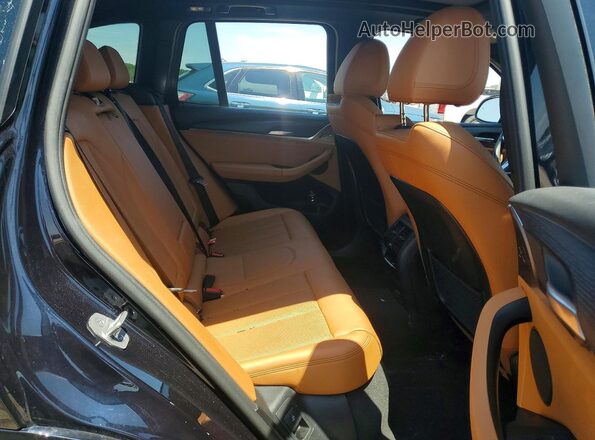 5UX53DP0XN9K19396 2022 BMW X3 Black Widok wnętrza z tyłu