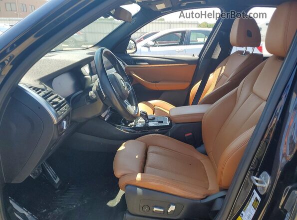 5UX53DP0XN9K19396 2022 BMW X3 Black Widok wnętrza z przodu