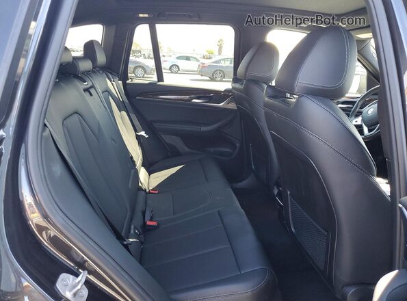 5UX53DP0XN9L06621 2022 BMW X3 Charcoal Rear interior view