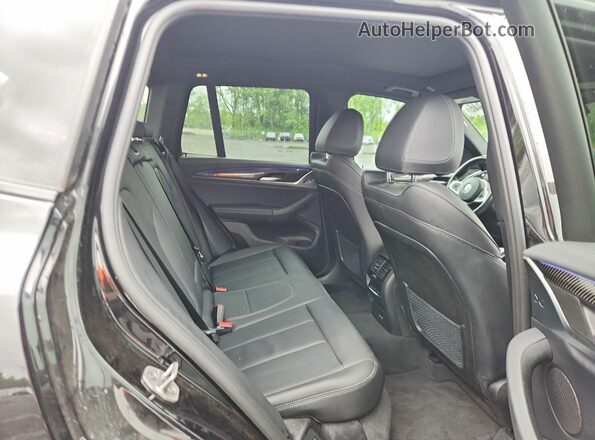 5UX83DP05N9K19111 2022 BMW X3 Black უკანა სალონის ხედი