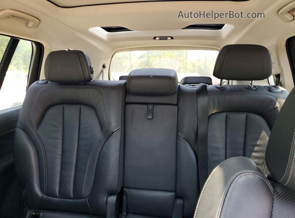 5UXCW2C00M9F67427 2021 BMW X7 Black Rear seats view