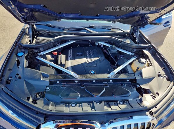 5UXCW2C02L9D35619 2020 BMW X7 Blue Widok komory silnika