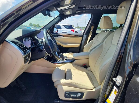 5UXTR7C53KLF32039 2019 BMW X3 Brown Front interior view