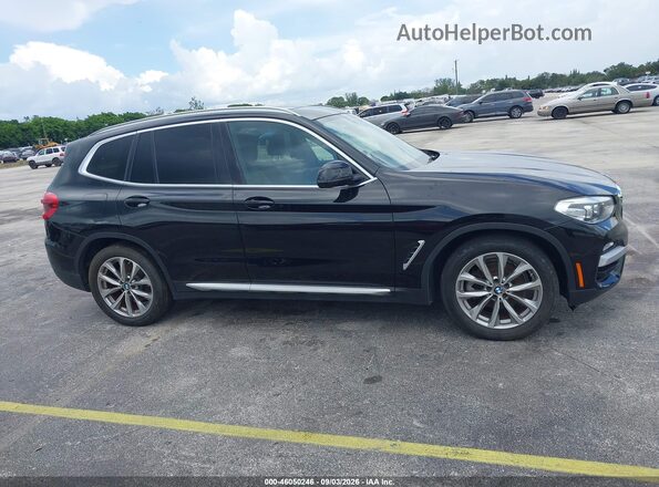 5UXTR7C59KLE94039 2019 BMW X3 Черный Вид задней части салона