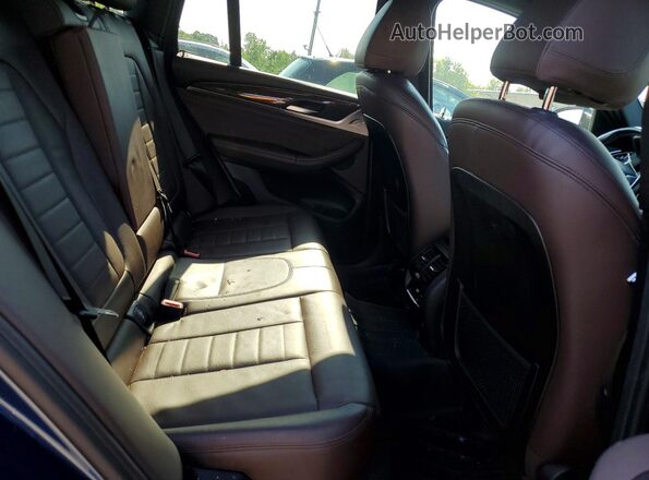 5UXTR9C59KLD92543 2019 BMW X3 Blue Vista interior trasera
