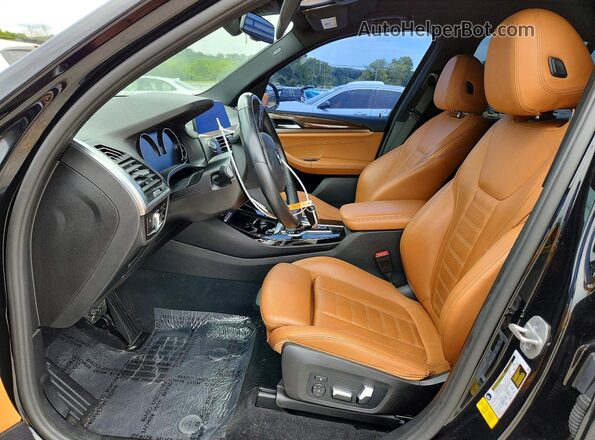 5UXTY3C00M9E77842 2021 BMW X3 Black Widok wnętrza z przodu