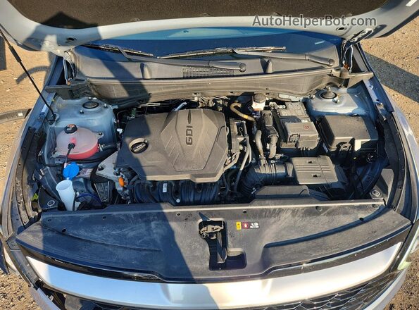 5XYK3CDF1SG246780 2025 KIA SPORTAGE Серый Вид задней части салона
