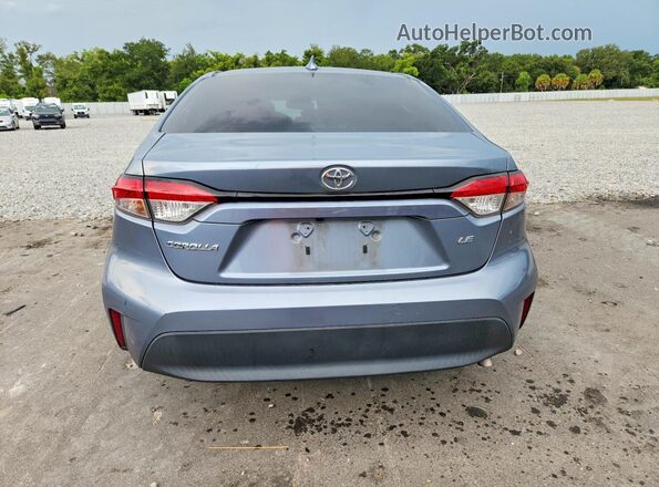 5YFB4MDEXPP033694 2023 TOYOTA COROLLA Серый Вид сзади