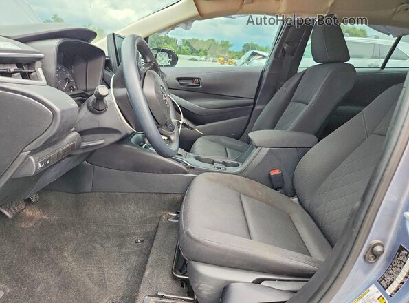 5YFB4MDEXPP033694 2023 TOYOTA COROLLA Серый Вид салона спереди