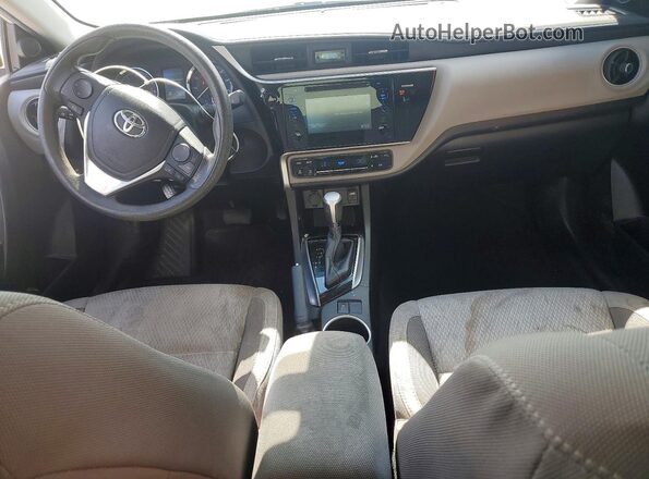 5YFBURHE1HP649907 2017 TOYOTA COROLLA White Առջևի վահանակի տեսք