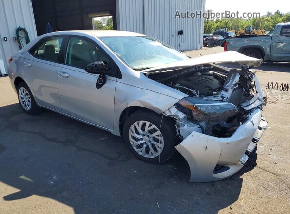 5YFBURHE1KP949860 2019 TOYOTA COROLLA Silver წინა მარჯვენა