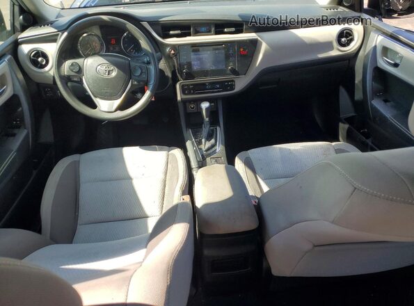 5YFBURHE1KP949860 2019 TOYOTA COROLLA Silver წინა პანელის ხედი