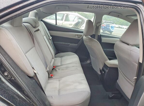 5YFBURHE2GP484531 2016 TOYOTA COROLLA Black Vista de los asientos traseros