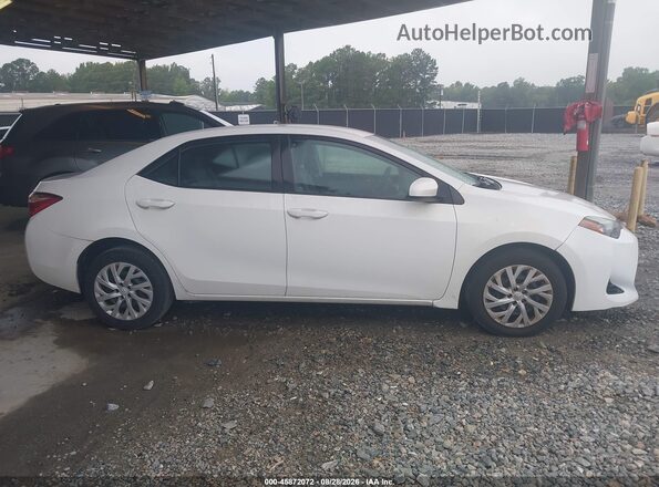 5YFBURHE2HP654033 2017 TOYOTA COROLLA White Вид задньої частини салону