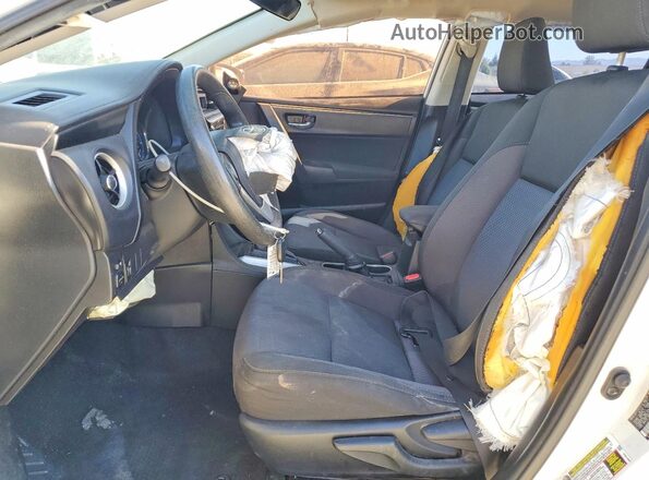 5YFBURHE2HP670975 2017 TOYOTA COROLLA White Front interior view